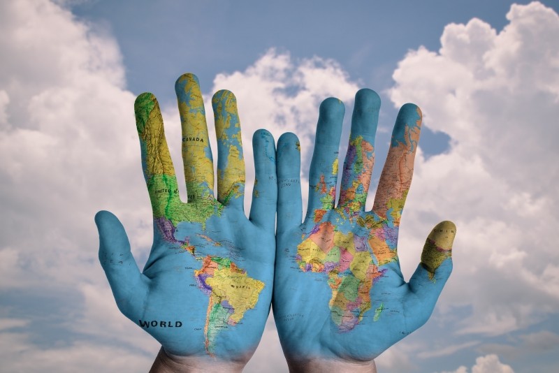 hands-world-map-global-earth-globe-blue-creative